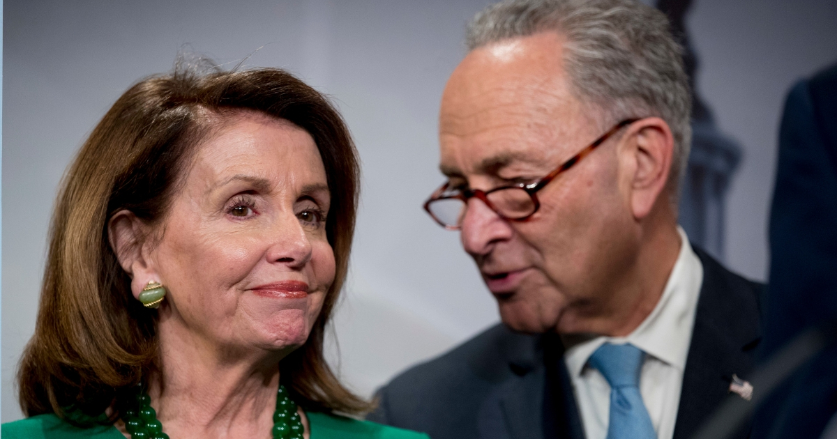 Senate Minority Leader Sen. Chuck Schumer of N.Y., right, and House Minority Leader Nancy Pelosi of Calif., left, speak together during a news conference on Capitol Hill in Washington.