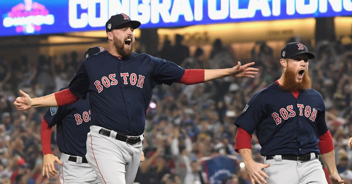 Heath Hembree, left, and Craig Kimbrel of the Boston Red Sox celebrate defeating the Los Angeles Dodgers 5-1 in Game 5 of the World Series on Sunday at Dodger Stadium.