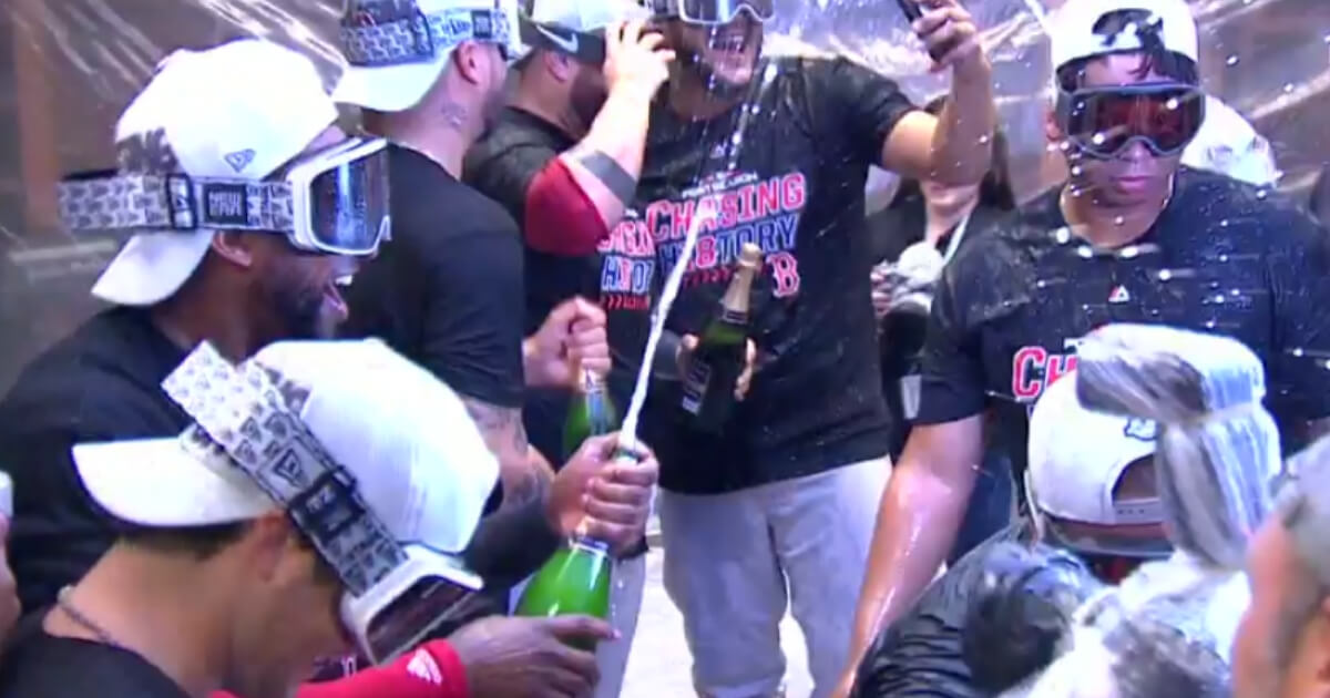 Red Sox players celebrate their series-clinching win Tuesday over the New York Yankees in the ALDS.