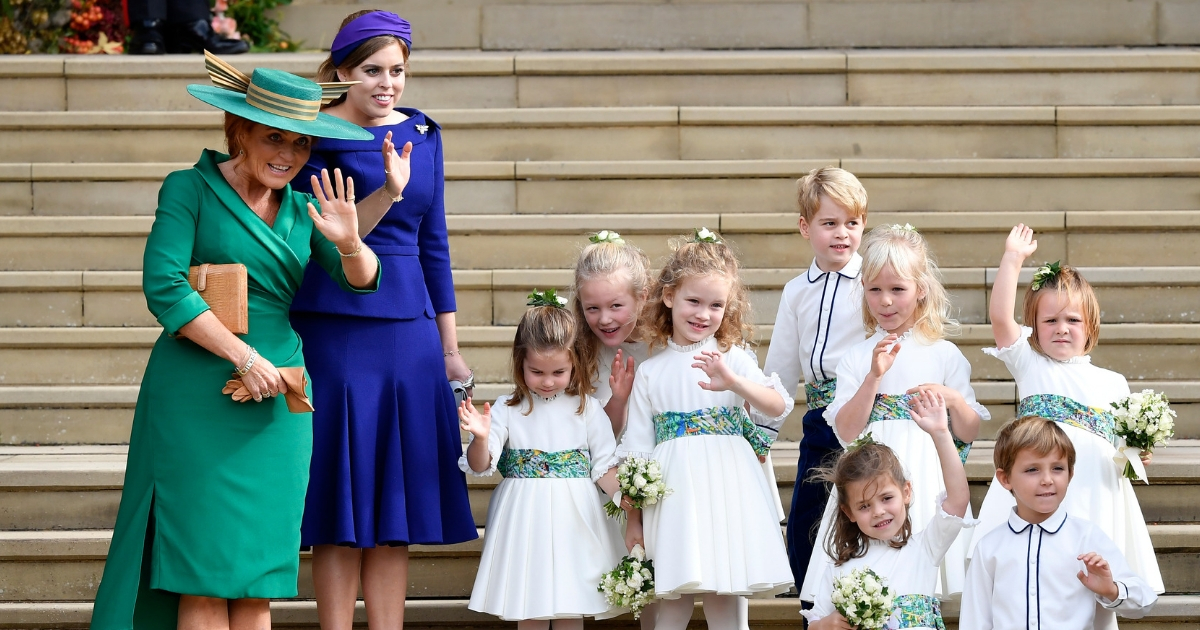 Sarah Ferguson and Princess Beatrice, the bridesmaids and page boys, including Prince George and Princess Charlotte, wave as they leave after the royal wedding of Princess Eugenie of York of York and her husband Jack Brooksbank at St George's Chapel in Windsor Castle on Oct. 12, 2018, in Windsor, England.