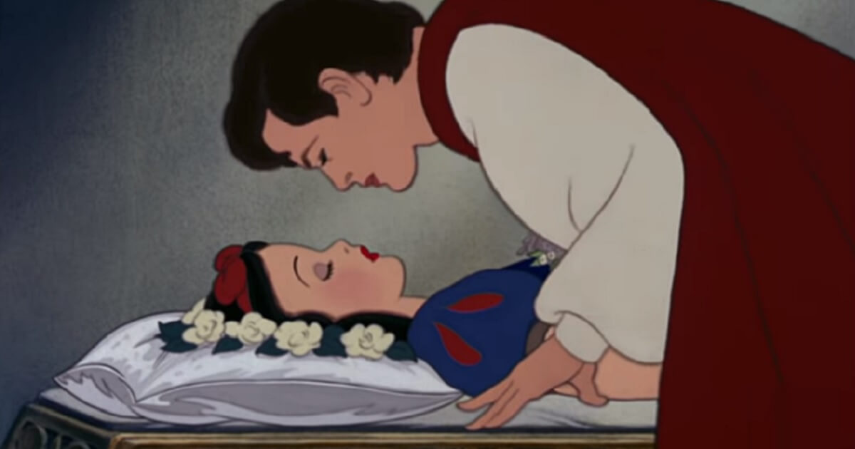 Prince Charming bends to kiss Snow White in the Disney classic.