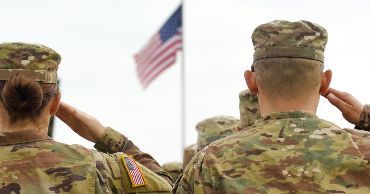 American Soldiers Saluting US Flag