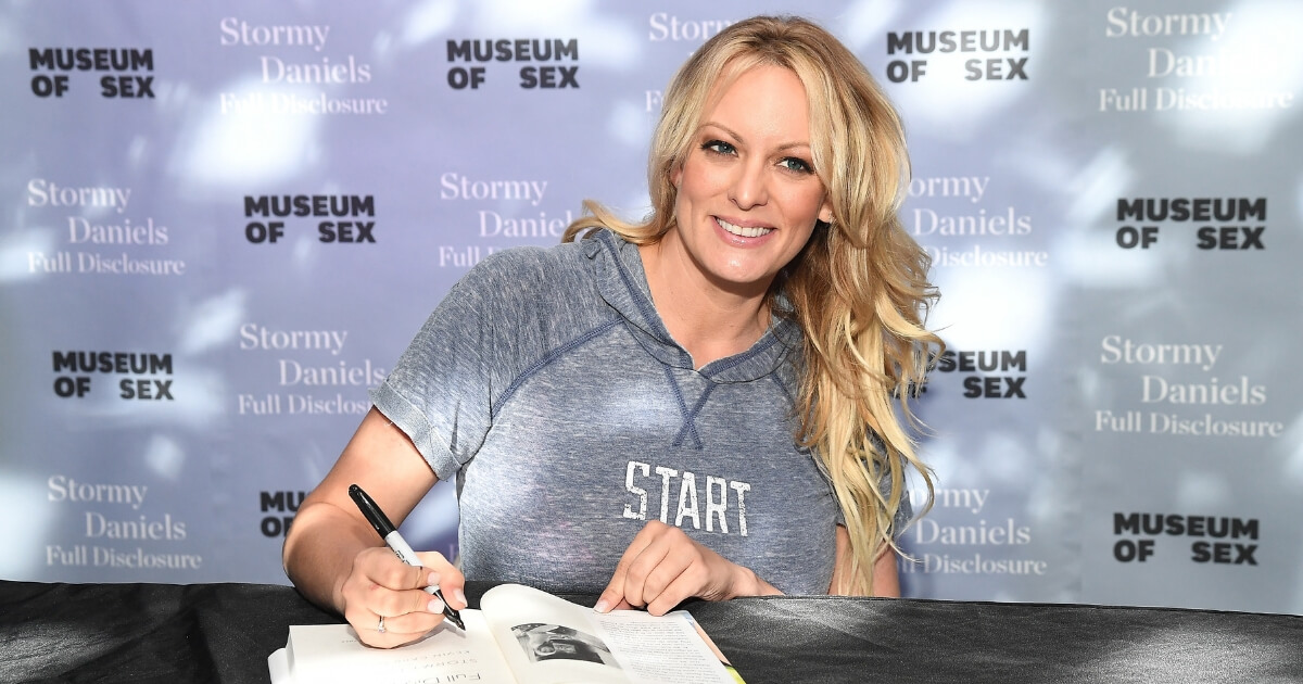 Porn star Stormy Daniels signs copies of her book "Full Disclosure" Monday at Museum of Sex in New York City.