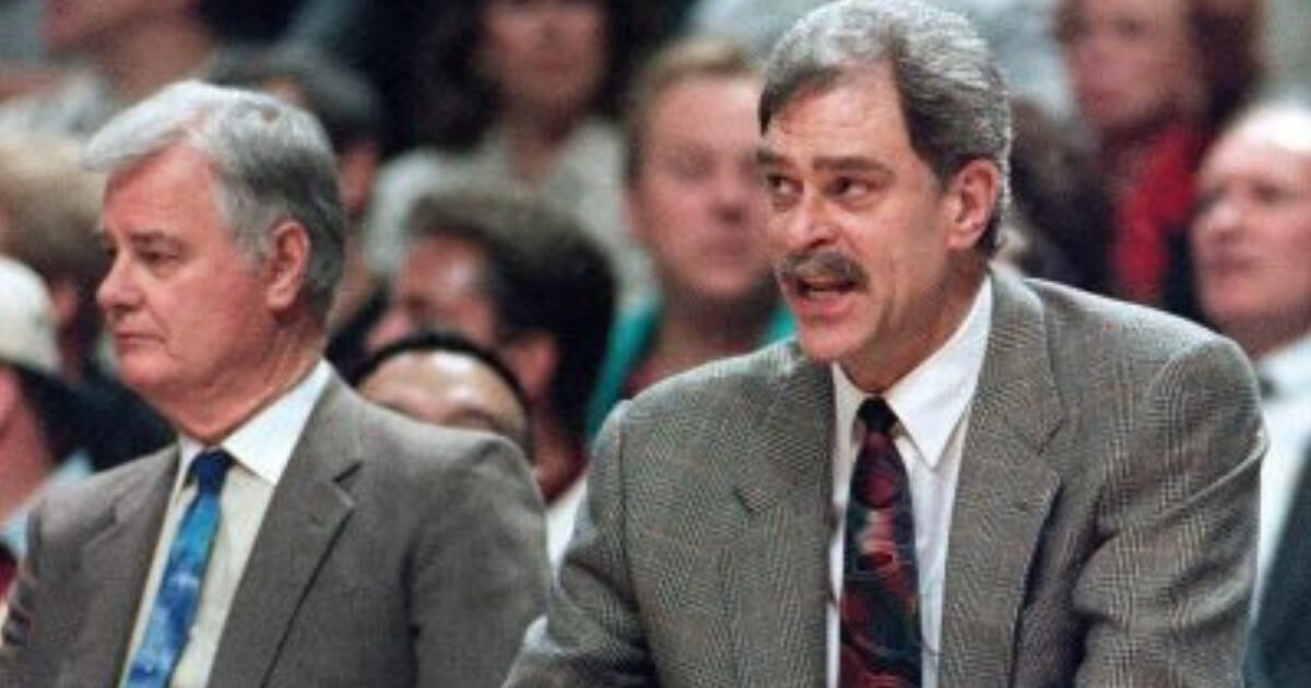 Chicago Bulls coach Phil Jackson, right, argues a call against his team, as he sits next to assistant coach Tex Winter during the 1995 NBA Playoffs.