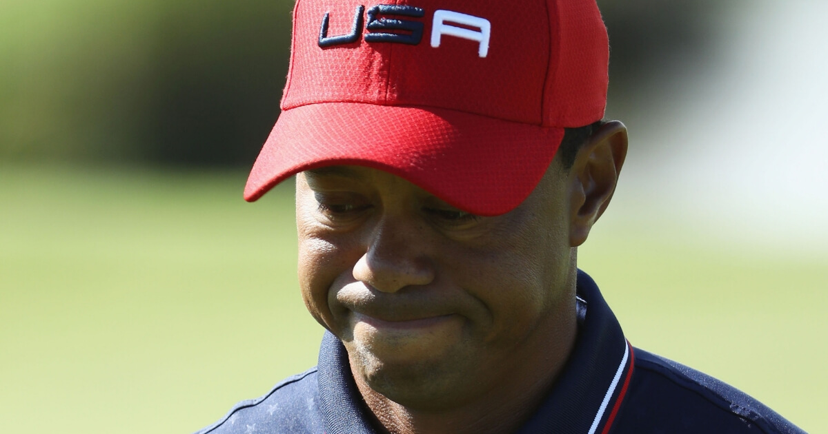 Tiger Woods reacts Sept. 30 during the Ryder Cup at Le Golf National in Paris.