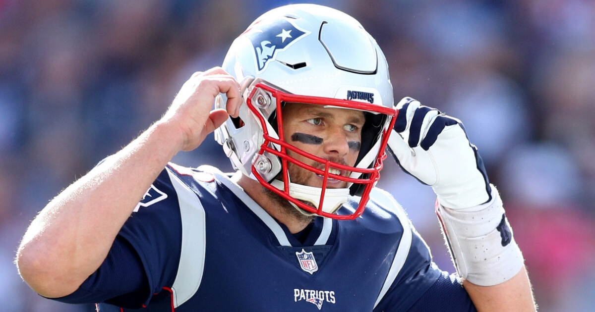 Tom Brady of the New England Patriots calls a play during a game against the Miami Dolphins at Gillette Stadium on Sept. 30.