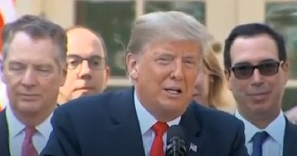 President Donald Trump addresses reporters in the White House Rose Garden