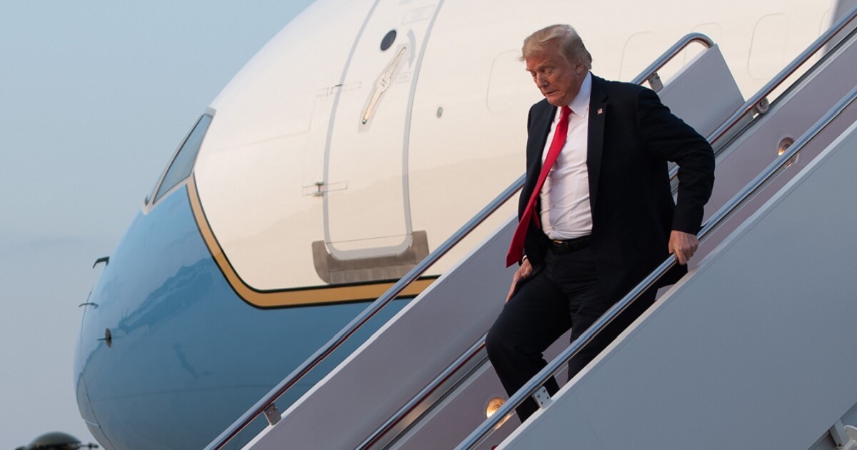 President Donald Trump descends the steps from Air Force One at Joint Base Andrews in Maryland in July.