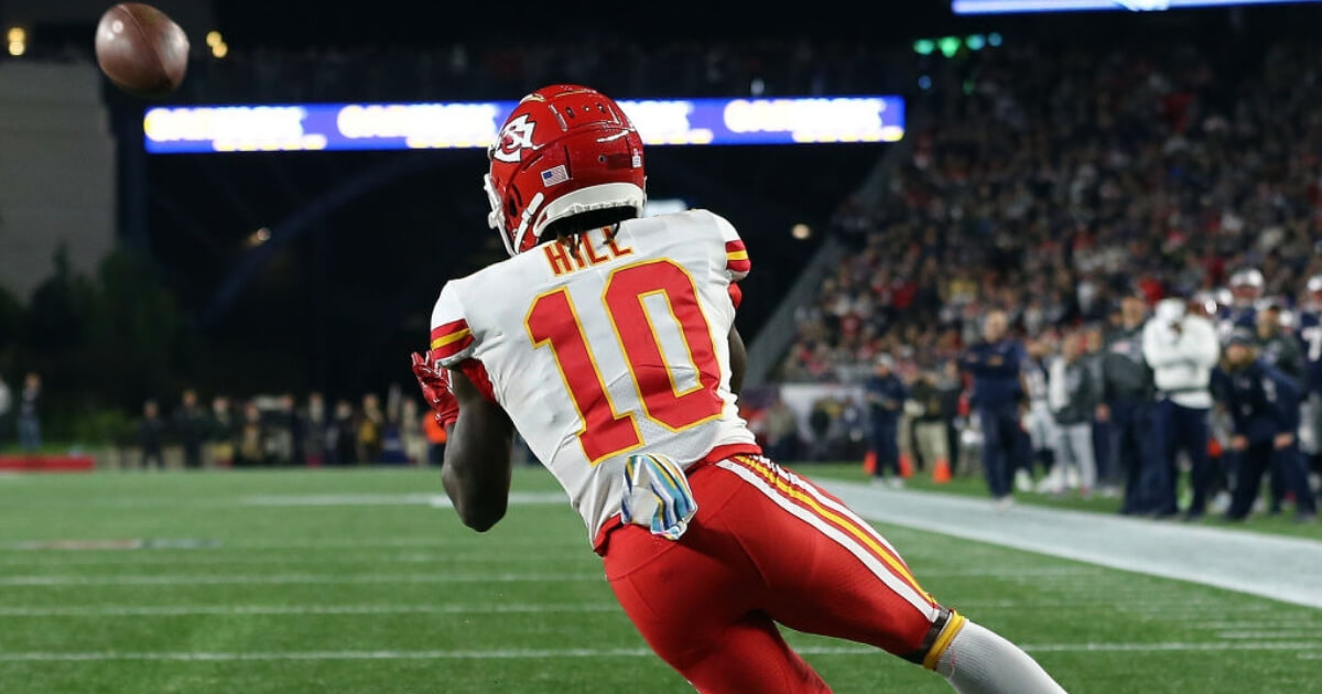 Kansas City's Tyreke Hill with one of his three touchdown receptions -- all in the second half -- in a 43-40 loss Sunday at New England.