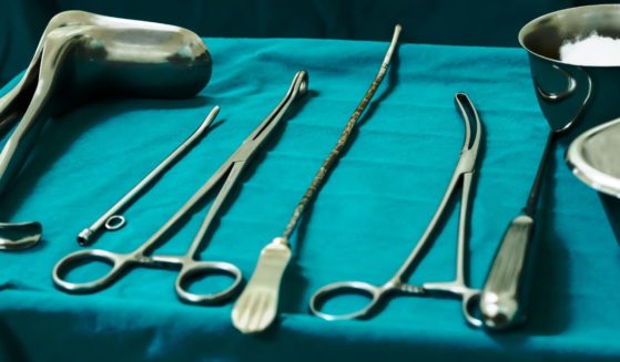 Abortion instruments are seen in a stock photo.
