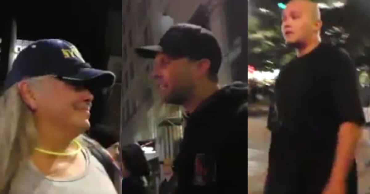 Man yelling at women, left and center. Man walking over to them, right.