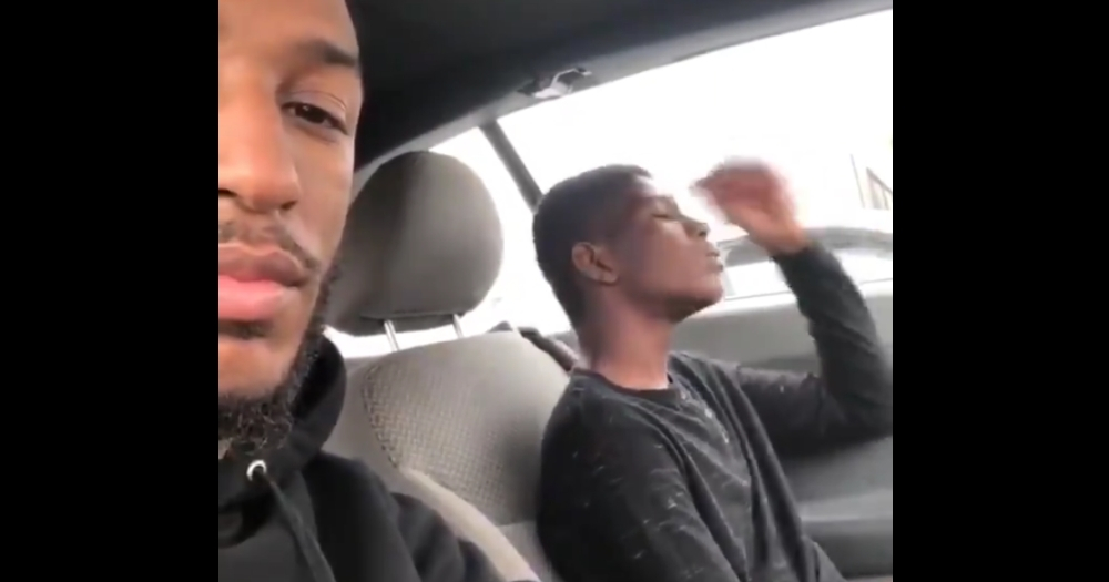 Man singing in the car with his son's bully.