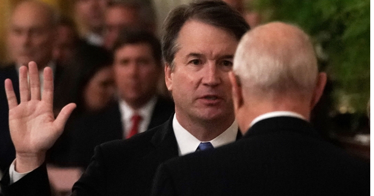 Supreme Court Justice Brett Kavanaugh participates in a ceremonial swearing in by retired Justice Anthony Kennedy. (Alex Wong / Getty Images)