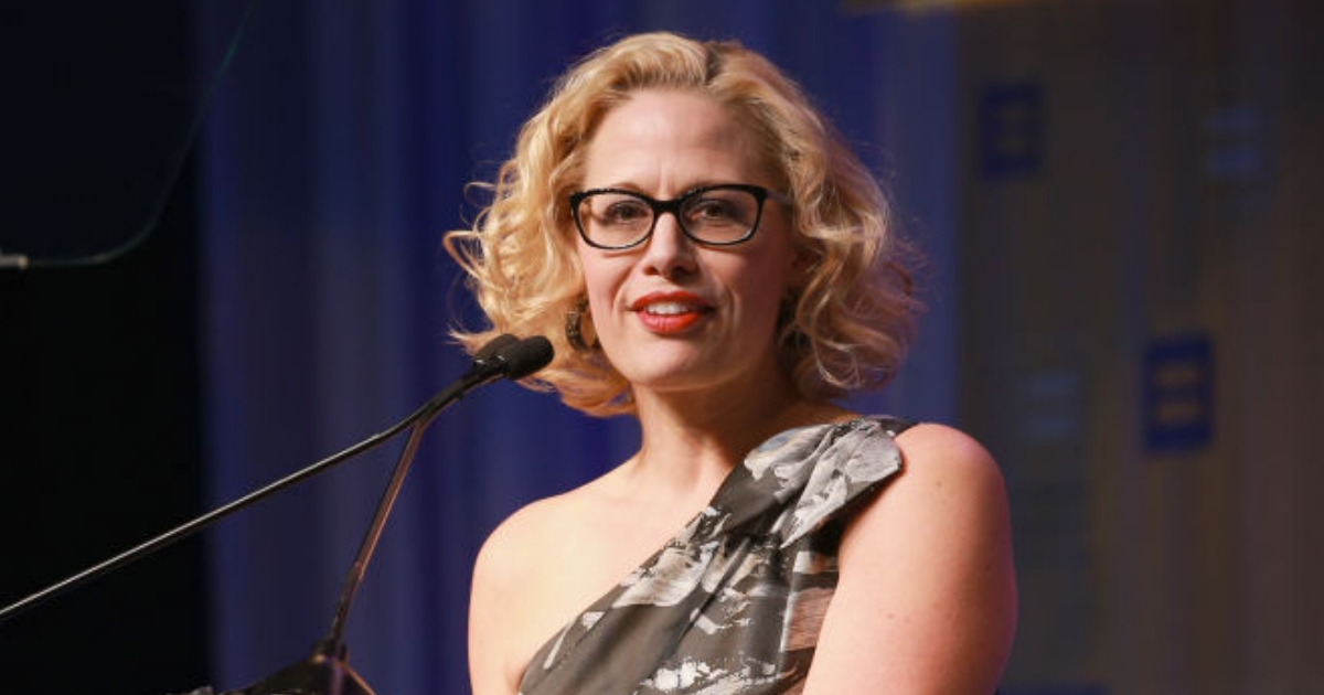 Congresswoman Kyrsten Sinema speaks onstage at The Human Rights Campaign