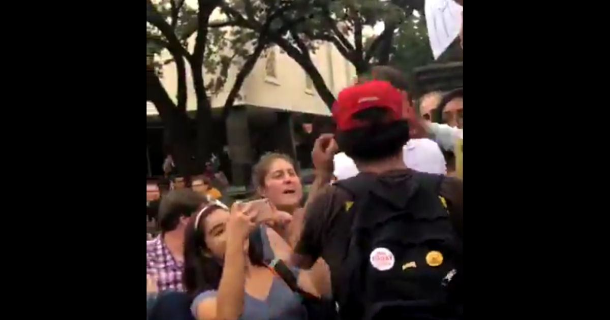 Man's MAGA hat ripped off