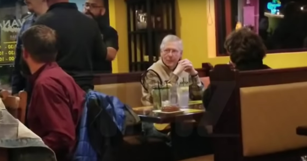 Mitch McConnell harassed at restaurant.