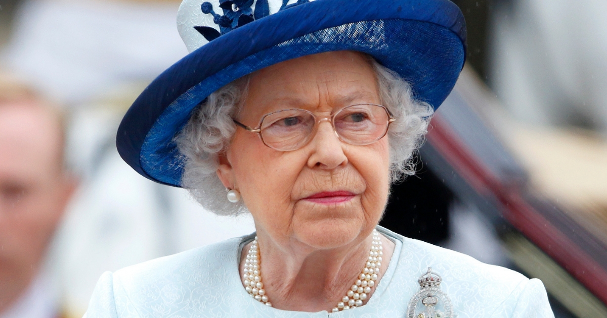 Queen Elizabeth II takes the salute outside Buckingham Palace during Trooping the Colour.