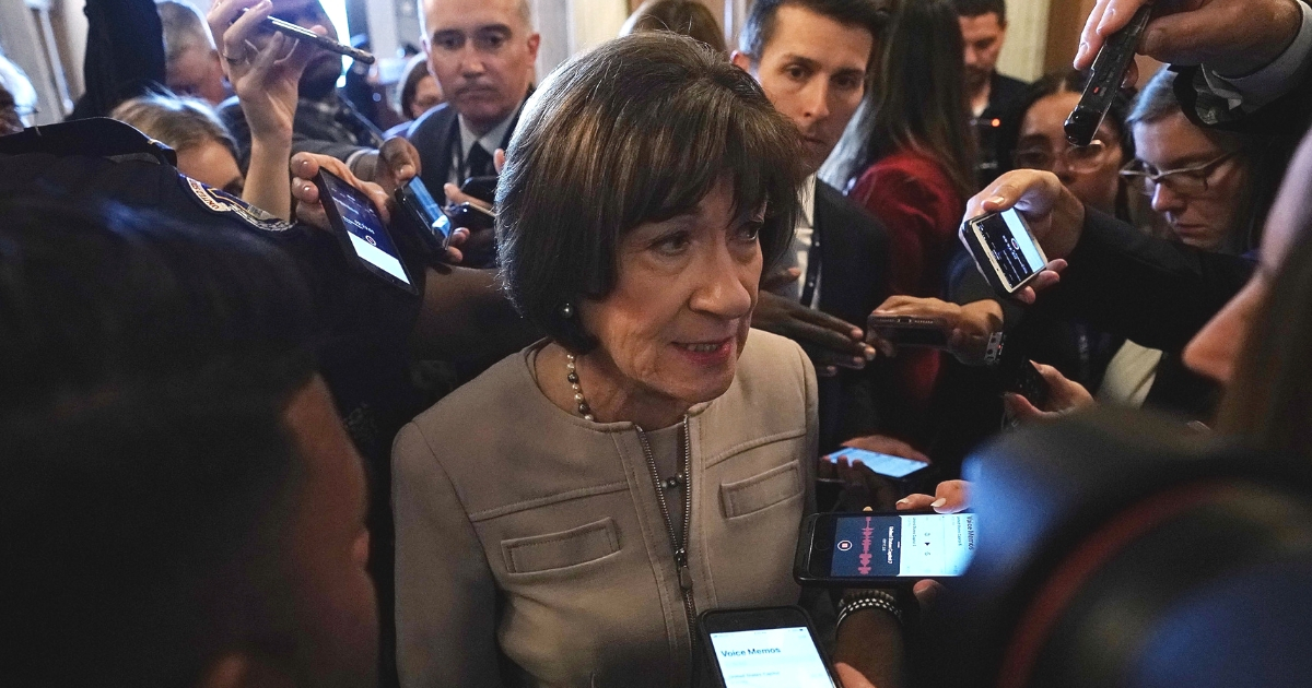 Sen. Susan Collins speaks to reporters after a floor speech to announce that she will vote for the nomination of Supreme Court Judge Brett Kavanaugh.