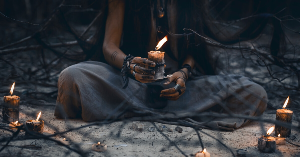 woman holding candles, witch