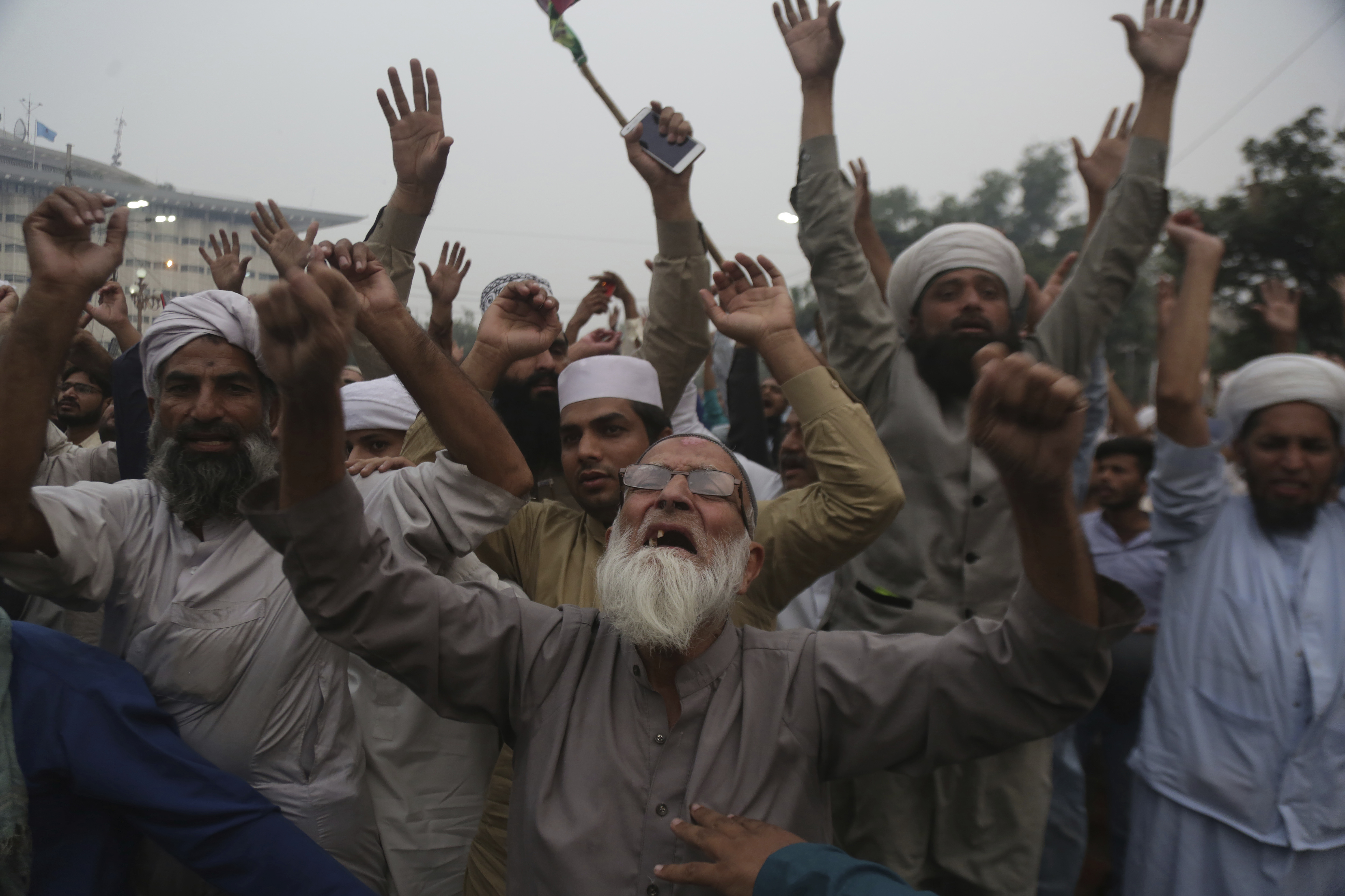 Protesters in Lahore, Pakistan, shout slogans Friday during a rally to condemn a court decision that acquitted Asia Bibi, a Christian woman who spent eight years on death row accused of blasphemy.