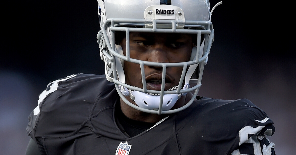Aldon Smith of the Oakland Raiders looks on during a 2015 game against the Minnesota Vikings.