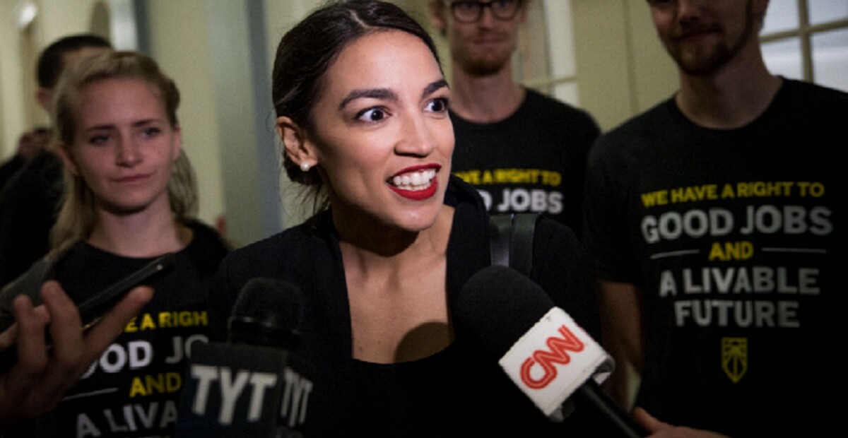 Rep.-elect Alexandria Ocasio-Cortez is interviewed by CNN while taking part in a Nov. 13 demonstration at House Minority Leader Nancy Pelosi's office in the Capitol.