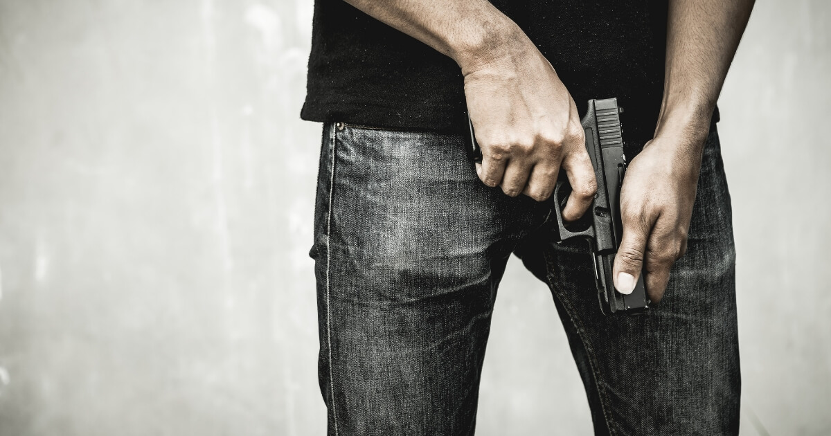 A man holding a gun.