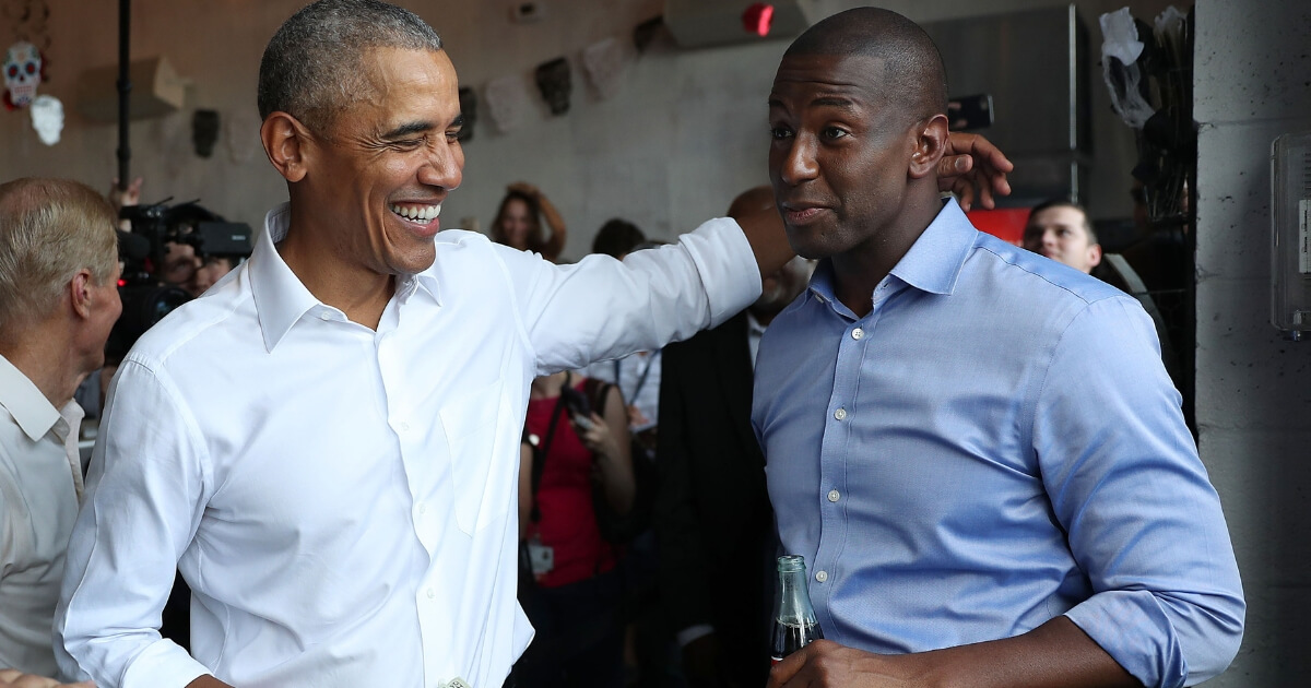 Former President Barack Obama orders lunch with Florida Democratic gubernatorial candidate Andrew Gillum at the Coyo Taco restaurant on Nov. 2, 2018, in Miami, Florida.