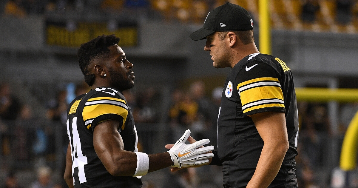 Pittsburgh Steelers stars Antonio Brown, left, and Ben Roethlisberger talk before their Sept. 30 game against the Baltimore Ravens at Heinz Field.