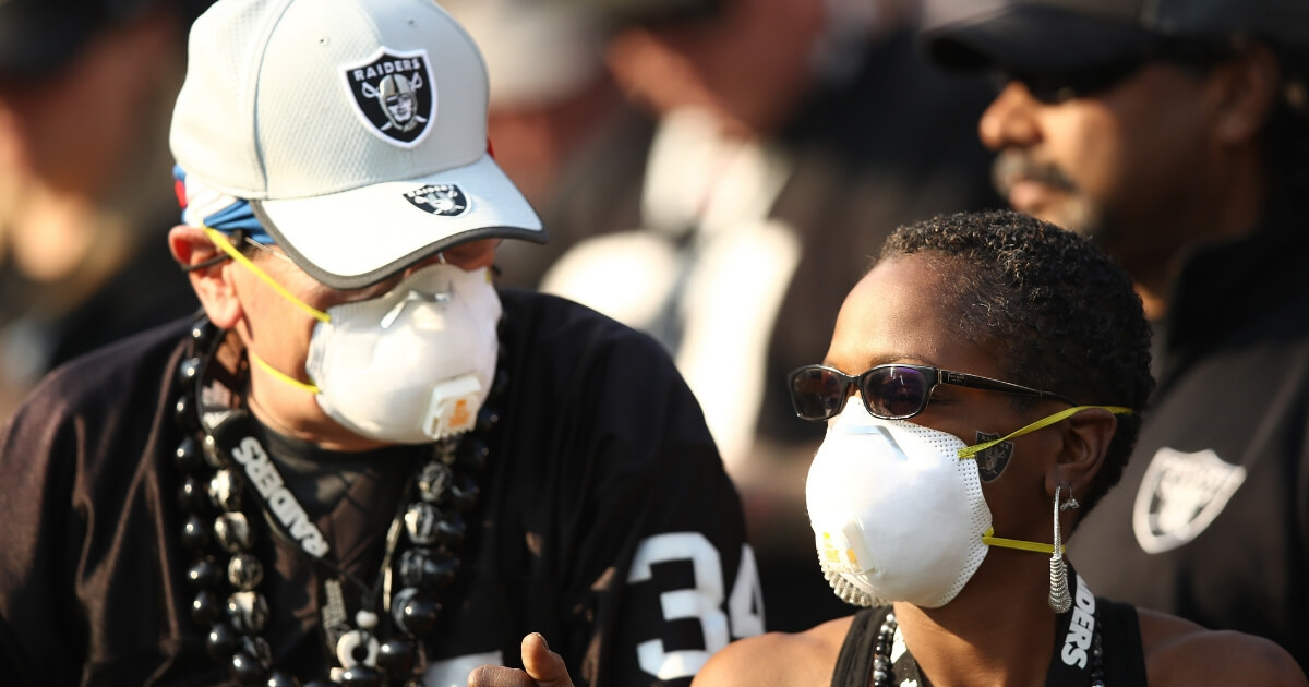 California fans wear face masks