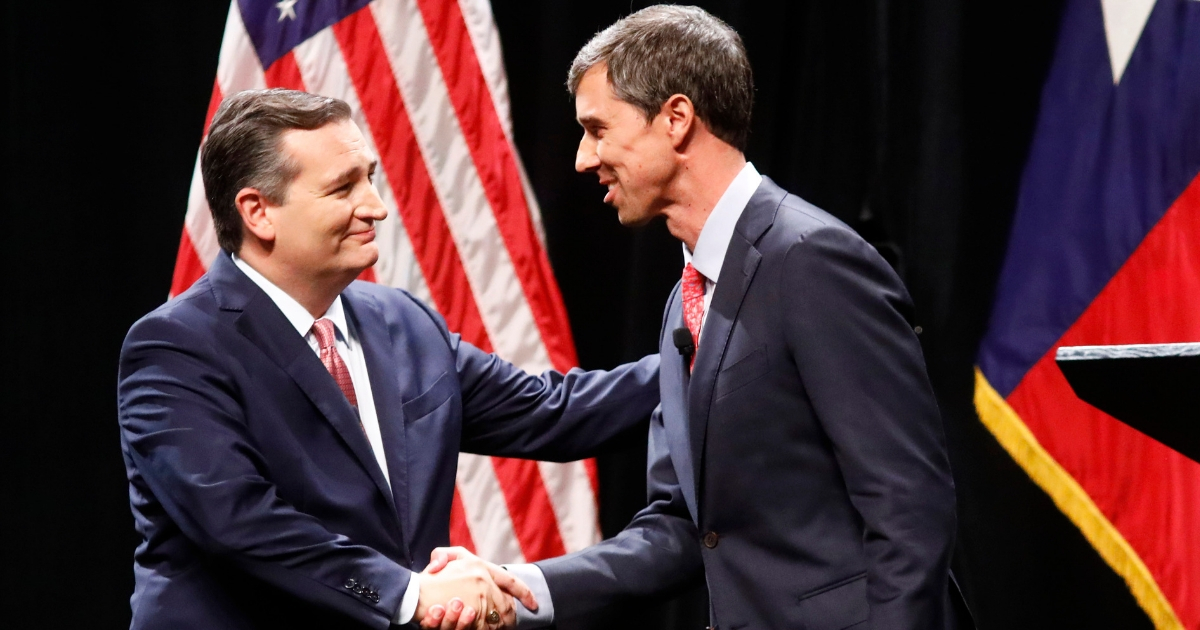 Republican Sen. Ted Cruz of Texas, left, shakes hands with Democratic challenger Beto O'Rourke after a debate at SMU on Sept. 21.