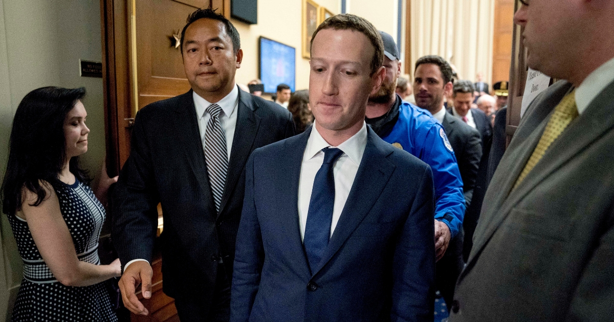 Facebook CEO Mark Zuckerberg departs after testifying before a House Energy and Commerce hearing on Capitol Hill in Washington, April 11, 2018.