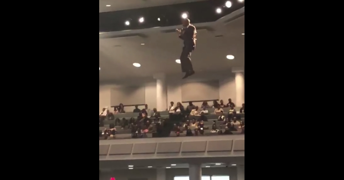 Pastor 'flying' above his congregation