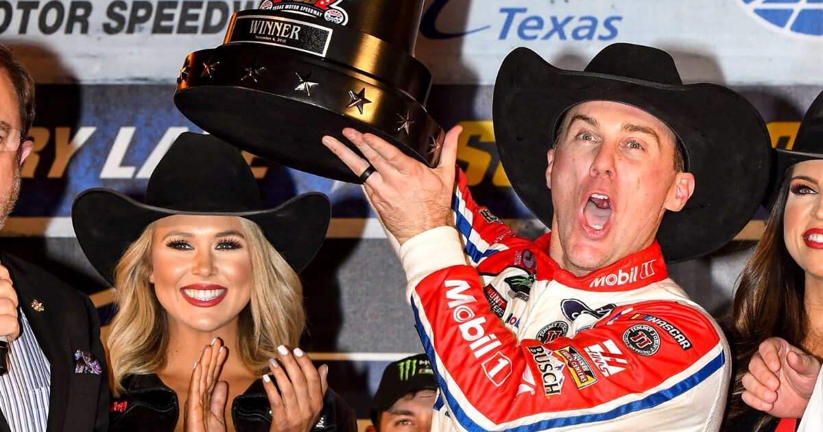 Kevin Harvick celebrates in Victory Lane after winning at Texas Motor Speedway on Sunday.