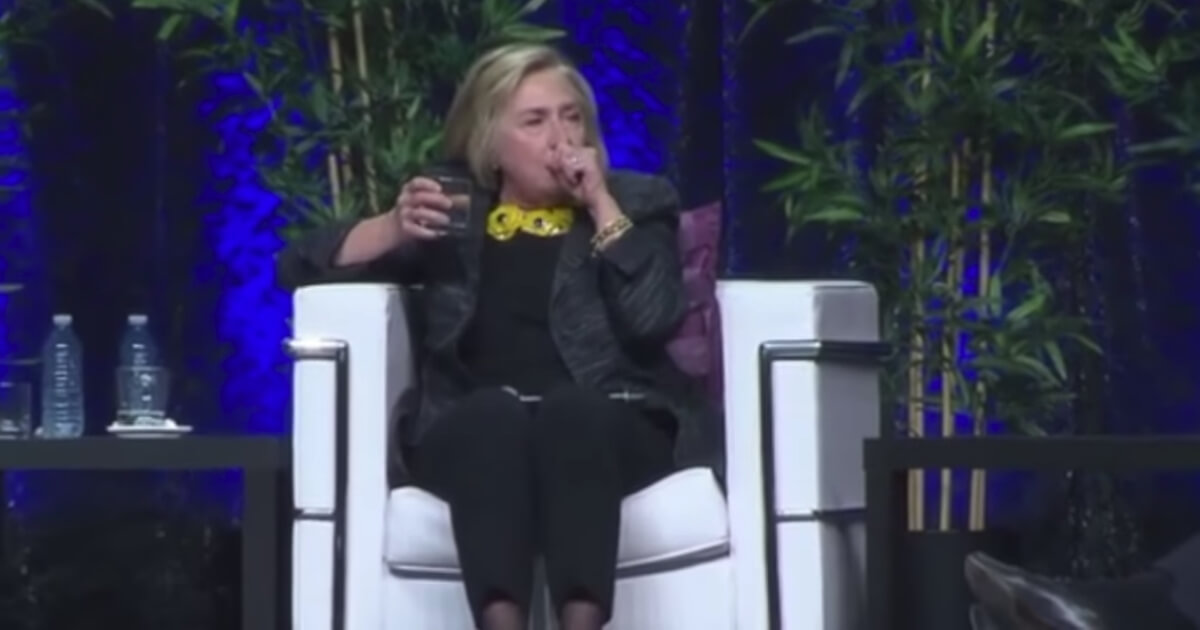 Hillary Clinton has a coughing fit in Toronto during her speaking tour.