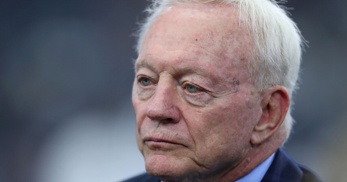Cowboys owner Jerry Jones stands on the field before his team's game against the Detroit Lions at AT&T Stadium on Sept. 30.
