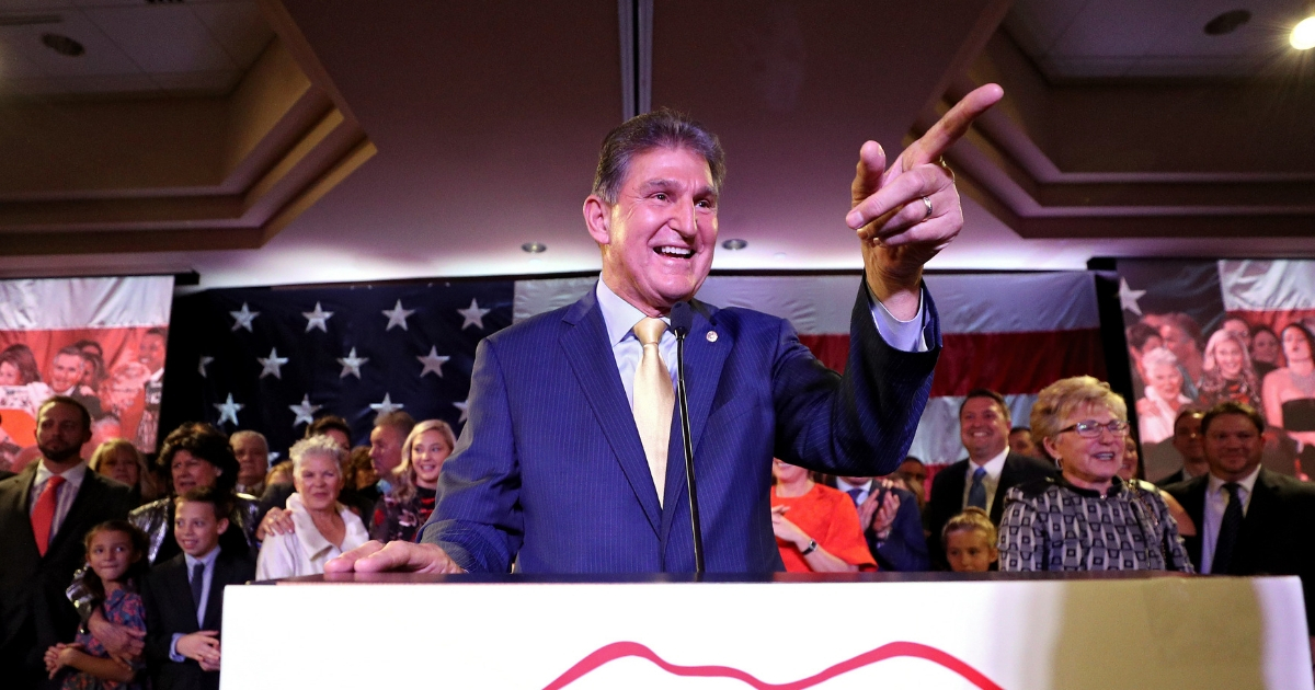 Sen. Joe Manchin celebrates at his election day victory party at the Embassy Suites on Nov. 6, 2018, in Charleston, West Virginia.