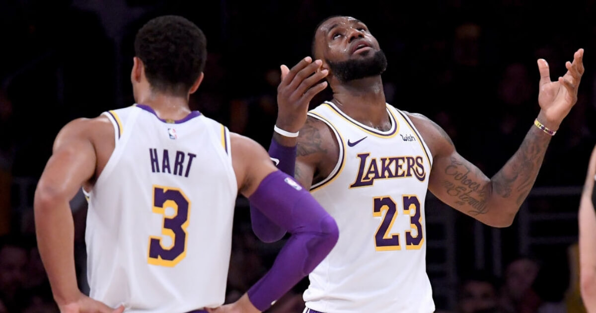 Josh Hart and LeBron James of the Lakers looking frustrated