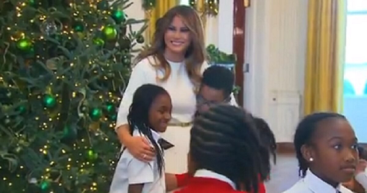 First lady Melania Trump greets children visiting the White House in a warm moment that completely foreign to the mainstream media's depiction of her role during the Trump presidency.