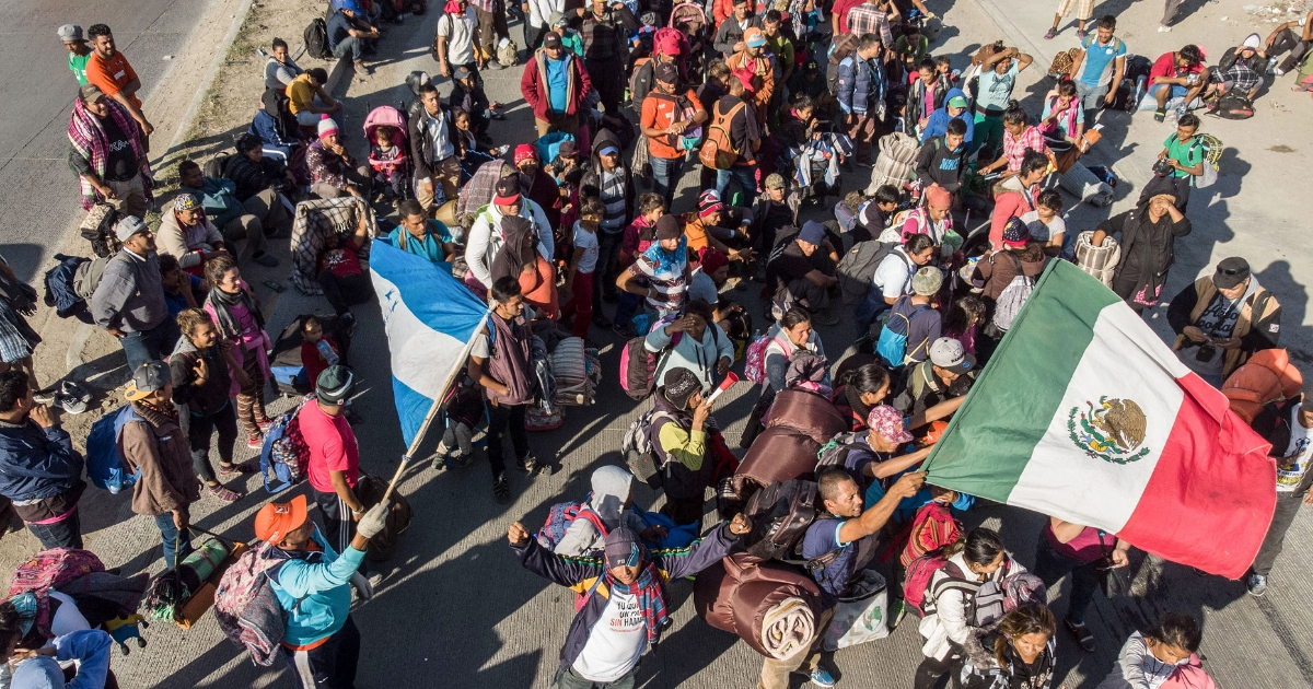 Central American migrants arrive in Tijuana, Mexico, on Thursday.