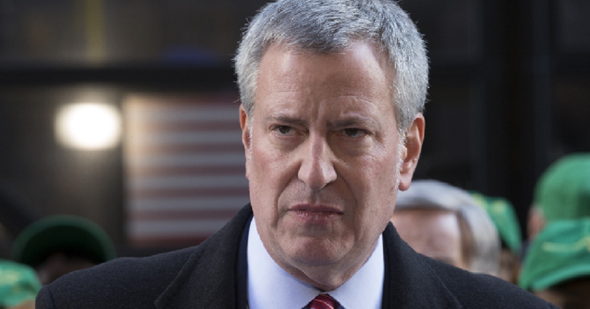 New York City Mayor Bill de Blasio is pictured speaking at a November 2017 rally against the GOP tax cuts.