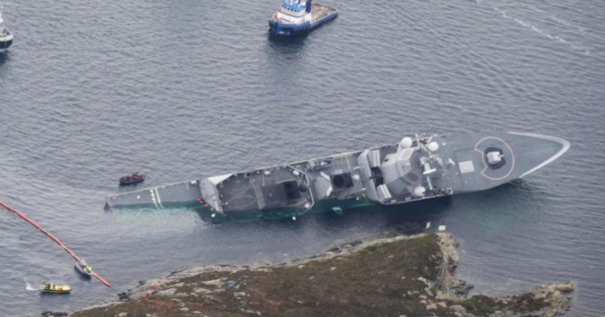 A Norwegian naval frigate that collided with an oil tanker was intentionally run aground by its captain to prevent it from sinking.
