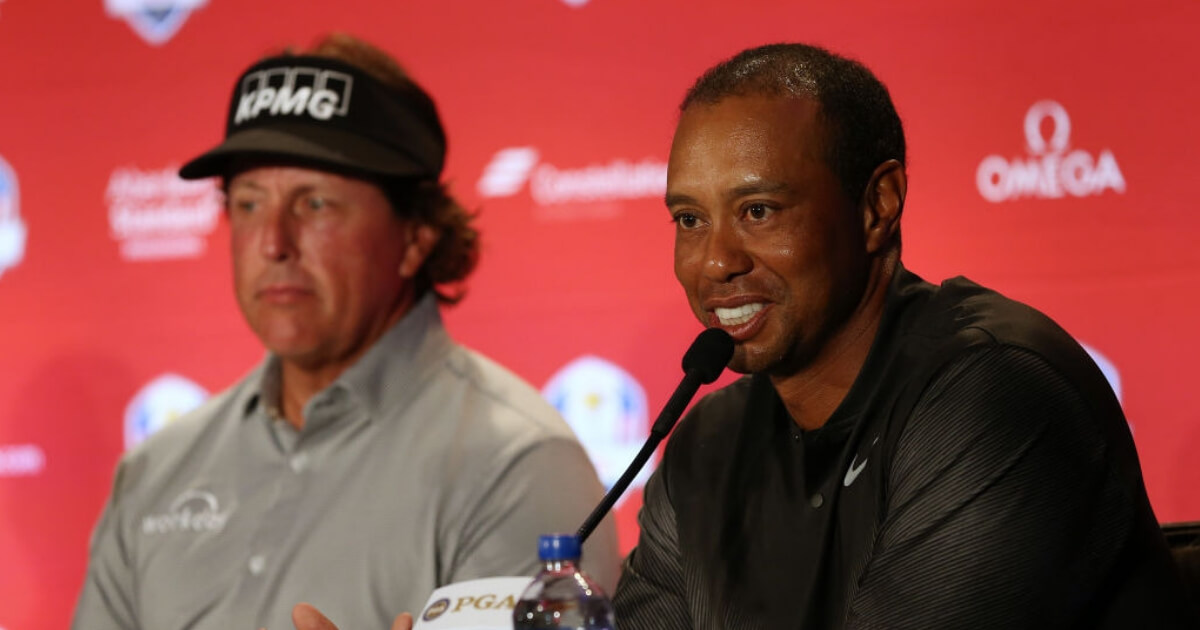 Phil Mickelson, left, and Tiger Woods