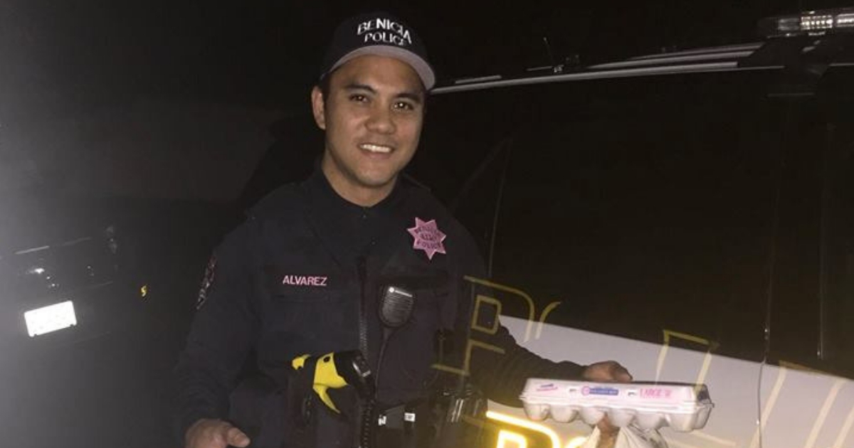 A police officer delivers groceries.