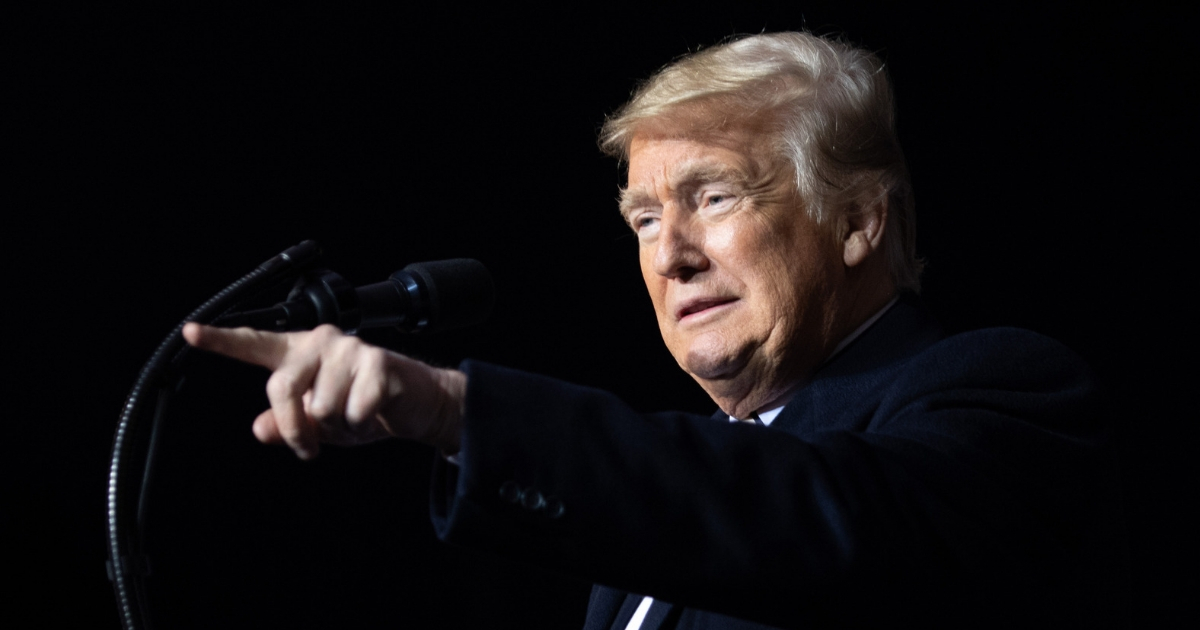 President Donald Trump gestures as he speaks during a campaign rally Thursday in Columbia, Missouri.