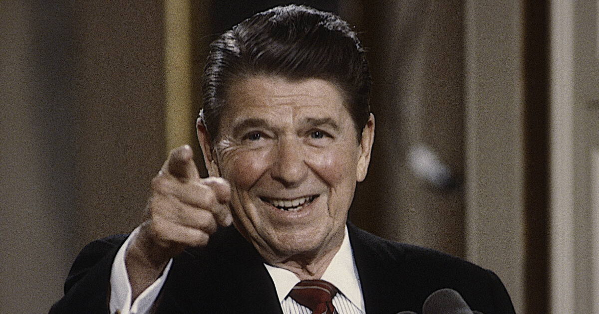 President Ronald Reagan points to a reporter during a May 1984 news conference.