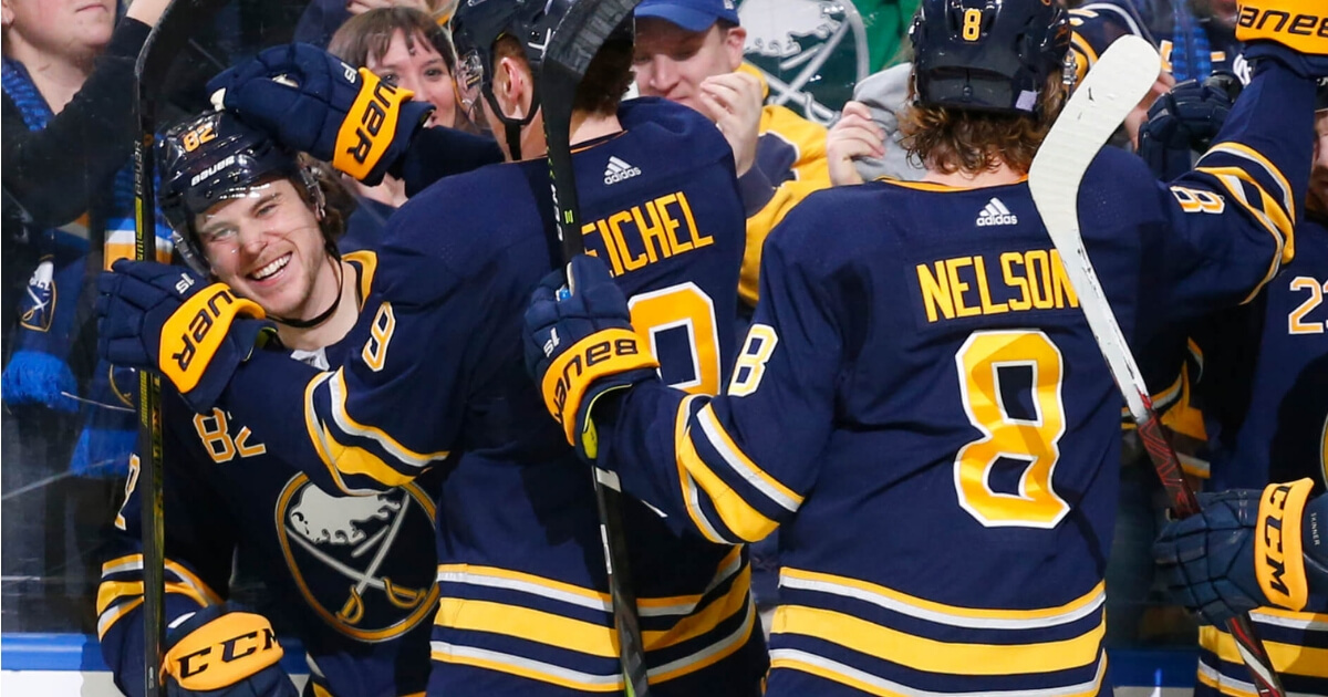 Sabres defenseman Nathan Beaulieu (82) celebrates his goal with teammates during the third period Tuesday against the San Jose Sharks in Buffalo.