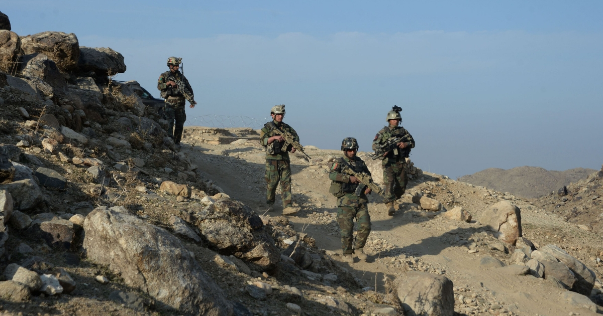 In this photograph taken on Jan. 3, 2018, Afghan commandos forces patrol during ongoing U.S.-Afghan military operation against Islamic State militants in Achin district of Nangarhar province.