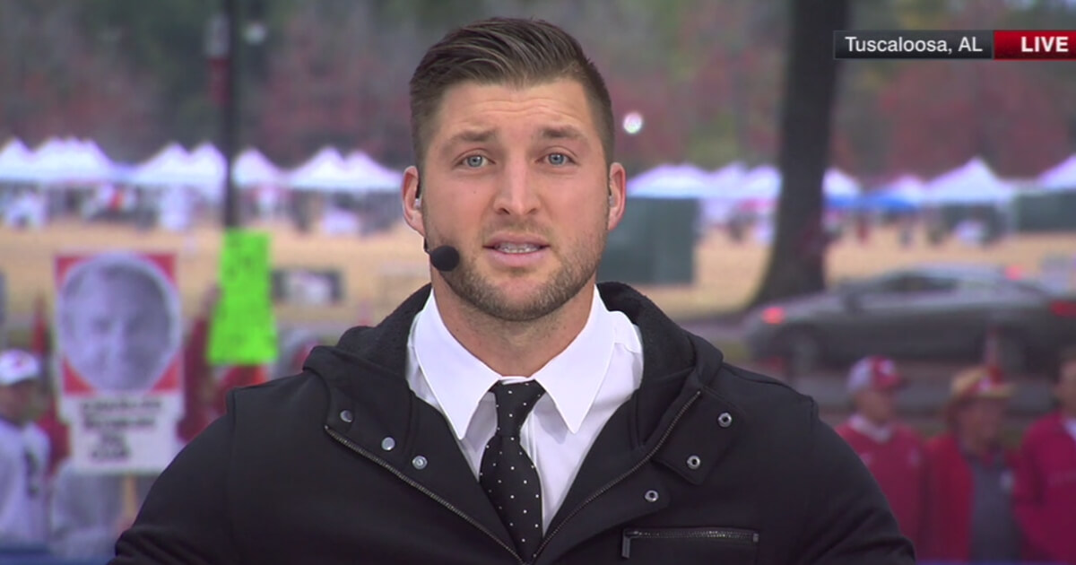 Tim Tebow talks up college football rivalry week in an ESPN appearance.