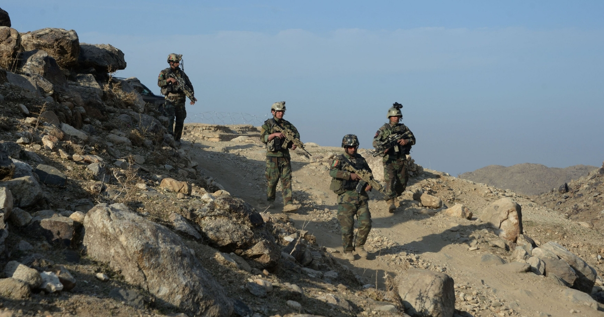 Afghan commandos forces patrol during ongoing U.S.-Afghan military operation against Islamic State militants in Achin district of Nangarhar province.